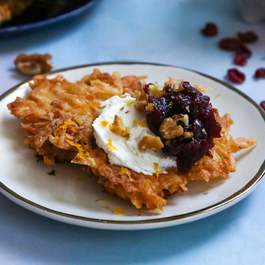 Latkes topped with Cranberry Compote and Goat Cheese