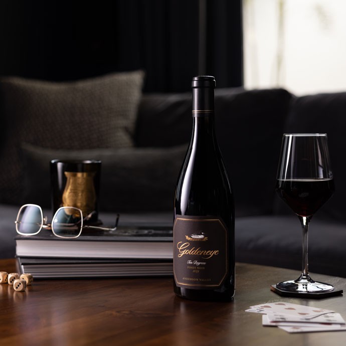 Ten Degrees on a table with a wine glass